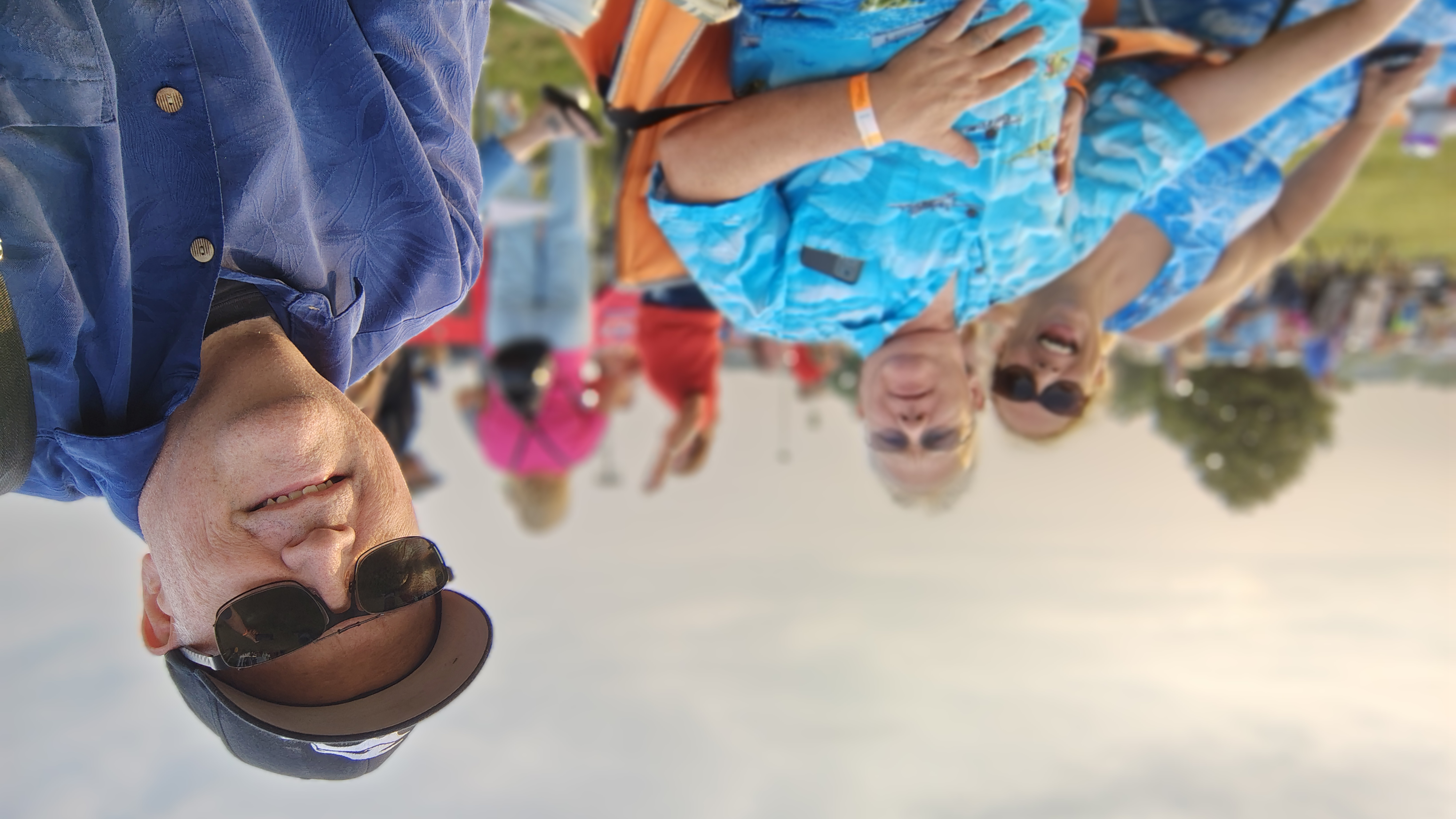 Image of Mike at outdoor concert with friends